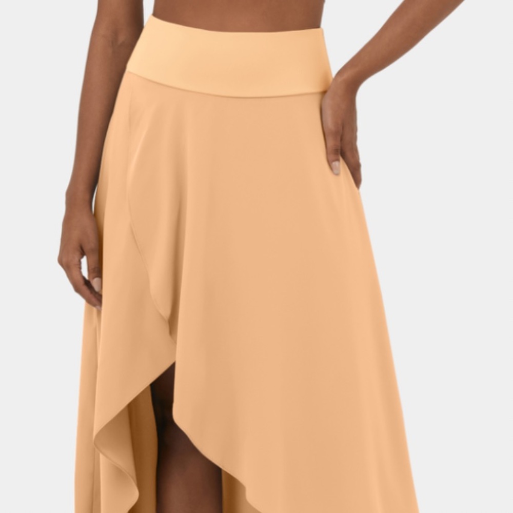 Halara NWT and bag skirt . Size small hi low skort